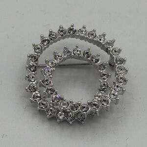 C559 vintage Nolan Miller silver tone double circle Crystal Brooch